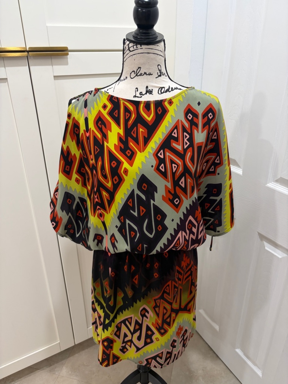 Donna Morgan Geometric Blouson Midi Dress in red, sage & lime green, black& pink